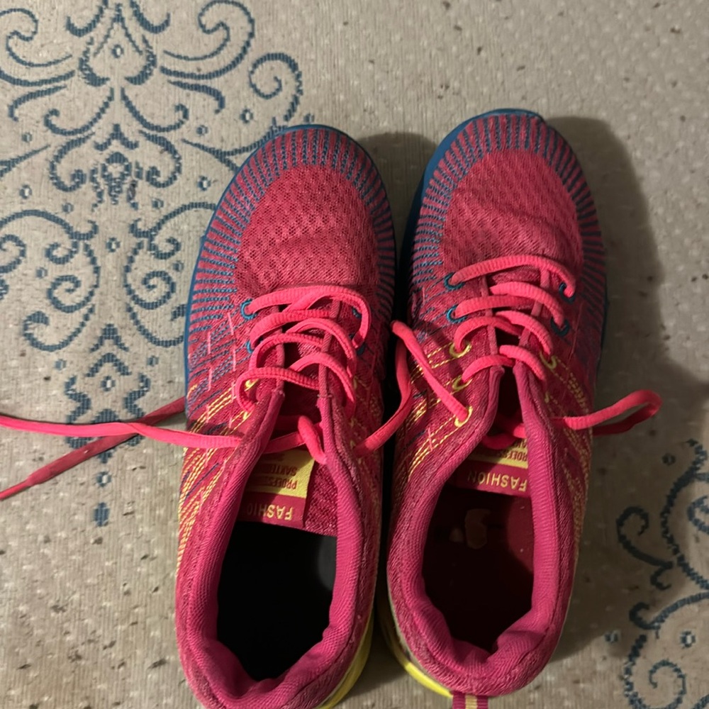 Pink blue yellow colored shoes